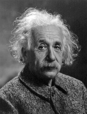 A black and white photograph of Albert Einstein.
