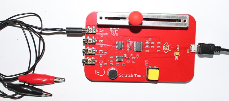 A PicoBoard connected to sensors.