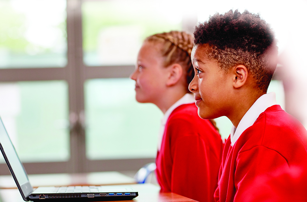 Pupils engaged attentively in a lesson